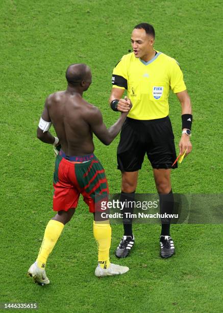 Referee Ismail Elfath shows a red card to Vincent Aboubakar of Cameroon after they scored their sides first goal during the FIFA World Cup Qatar 2022...