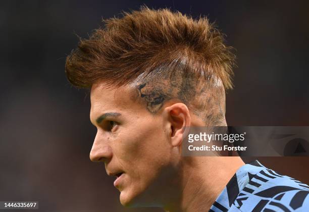 The Lion tattoo on the head of goalkeeper Sebastian Sosa is pictured during the warm up during the FIFA World Cup Qatar 2022 Group H match between...