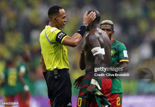 Referee Ismail Elfath shows a red card to Vincent Aboubakar of Cameroon after they scored their sides first goal during the FIFA World Cup Qatar 2022...