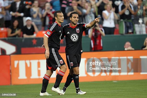 Dwayne De Rosario and Hamdi Salihi of D.C. United celebrate after a goal against the Colorado Rapids at RFK Stadium on May 16, 2012 in Washington, DC.