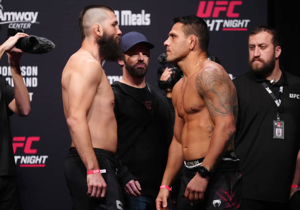 Opponents Bryan Barberena and Rafael Dos Anjos of Brazil face off during the UFC Fight Night ceremonial weigh-in at Amway Center on December 02, 2022...