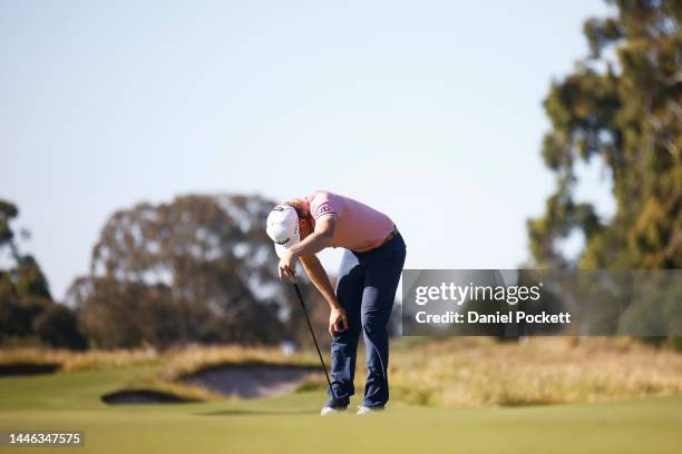 Cameron Smith of Australia reacts after missing a putt during Day 3 of the 2022 ISPS HANDA Australian Open at Victoria Golf Club on December 03, 2022...