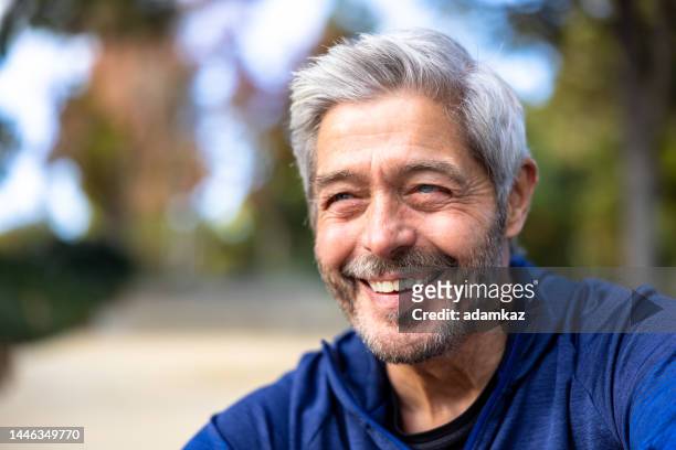 portrait of a senior man at a workout - bearded man stock pictures, royalty-free photos & images