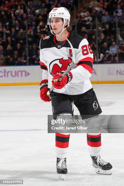 Jack Hughes of the New Jersey Devils skates against the New York Rangers at Madison Square Garden on November 28, 2022 in New York City.