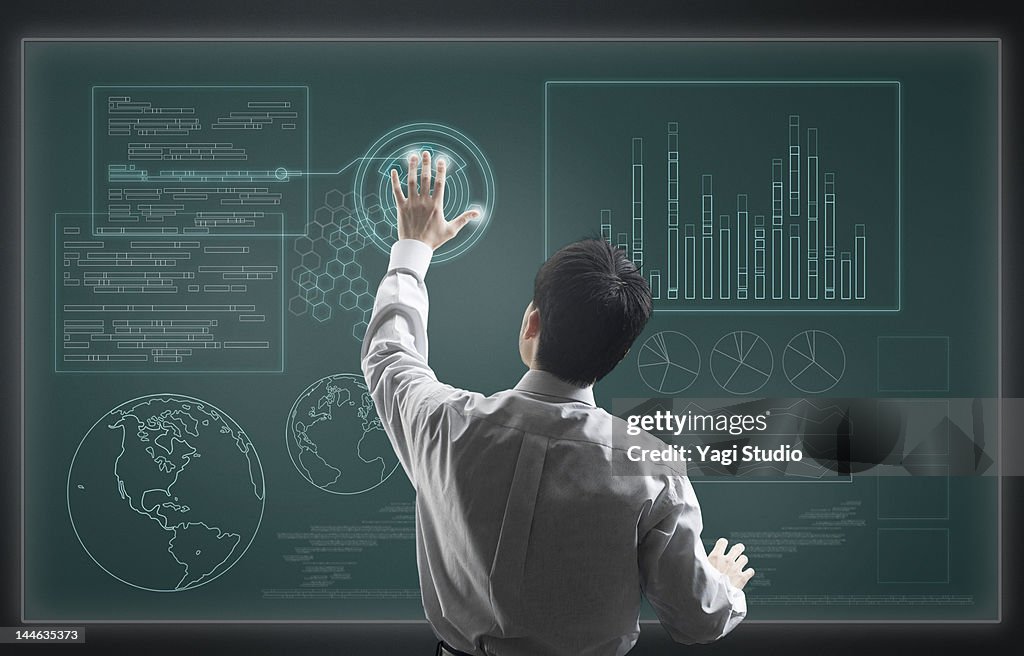 Man using hi-tech computer monitor