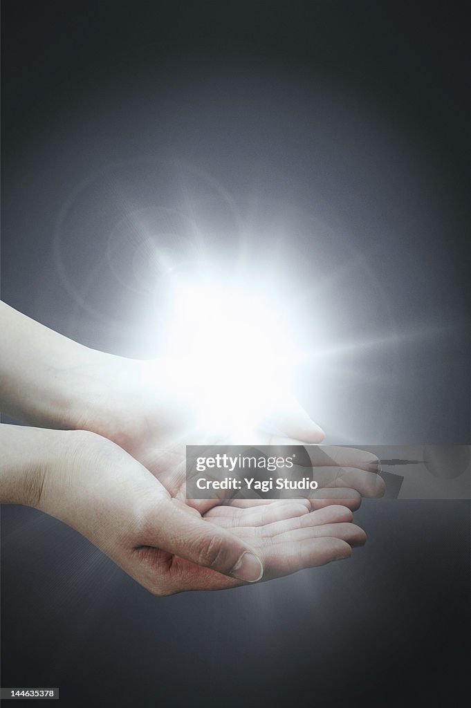 Hand With Light High-Res Stock Photo - Getty Images