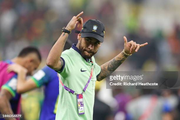 Neymar of Brazil acknowledges the fans after the team's qualification to the knockout stages during the FIFA World Cup Qatar 2022 Group G match...