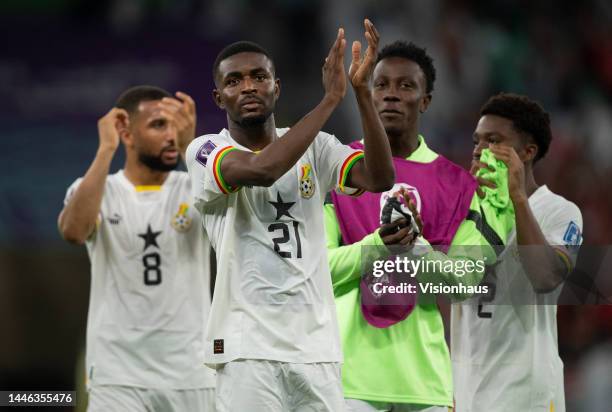 Salis Abdul Samed, Daniel-Kofi Kyereh and Tariq Lamptey of Ghana applaud fans following the FIFA World Cup Qatar 2022 Group H match between Korea...