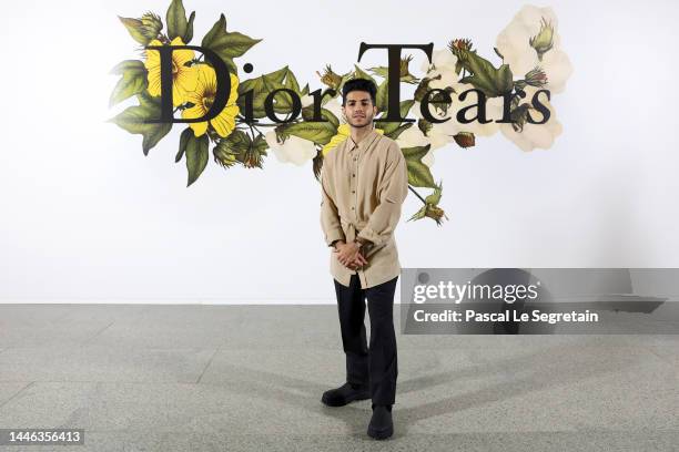 Mena Massoud attends Dior Tears photocall on December 02, 2022 in Cairo, Egypt.