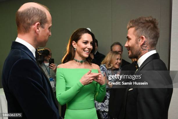 Prince William, Prince of Wales, Catherine, Princess of Wales and David Beckham speak backstage after The Earthshot Prize 2022 at MGM Music Hall at...