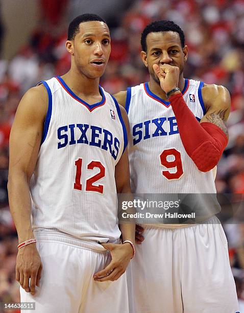 Evan Turner and Andre Iguodala of the Philadelphia 76ers stand on the court during the game against the Boston Celtics in Game Three of the Eastern...