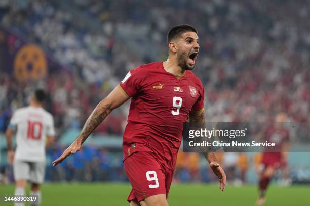 Aleksandar Mitrovic of Serbia celebrates after scoring his team's first goal during the FIFA World Cup Qatar 2022 Group G match between Serbia and...