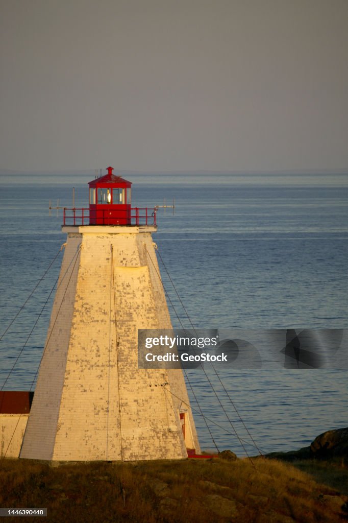 An Atlantic Ocean lighthouse at dusk