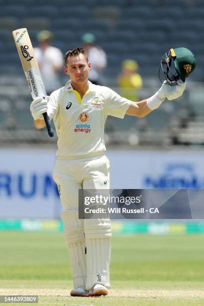 Marnus Labuschange of Australia raises his bat after scoring 100 runs during day four of the First Test match between Australia and the West Indies...