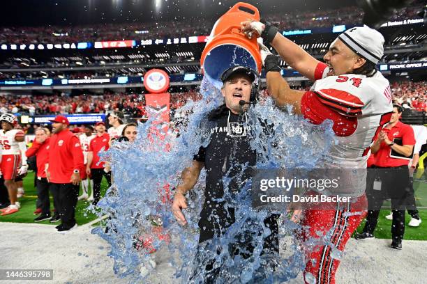 Head coach Kyle Whittingham of the Utah Utes gets a Gatorade bath by Paul Maile during the fourth quarter in the Pac-12 Championship against the USC...