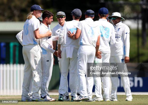 Players celebrate the wicket of Campbell Kellaway during the Sheffield Shield match between Victoria and New South Wales at CitiPower Centre, on...