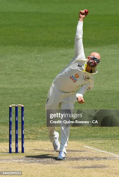 Nathan Lyon of Australia bowls during day four of the First Test match between Australia and the West Indies at Optus Stadium on December 03, 2022 in...
