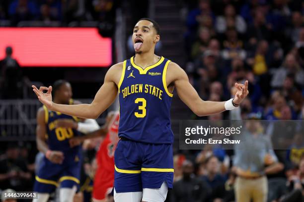 Jordan Poole of the Golden State Warriors reacts after he made a three-point basket against the Chicago Bulls at Chase Center on December 02, 2022 in...