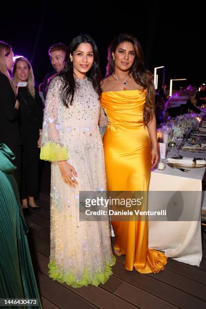 Freida Pinto and Priyanka Chopra attend the Women in Cinema red carpet during the Red Sea International Film Festival on December 02, 2022 in Jeddah,...