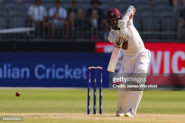 Kraigg Brathwaite of the West Indies hits a cover drive during day four of the First Test match between Australia and the West Indies at Optus...
