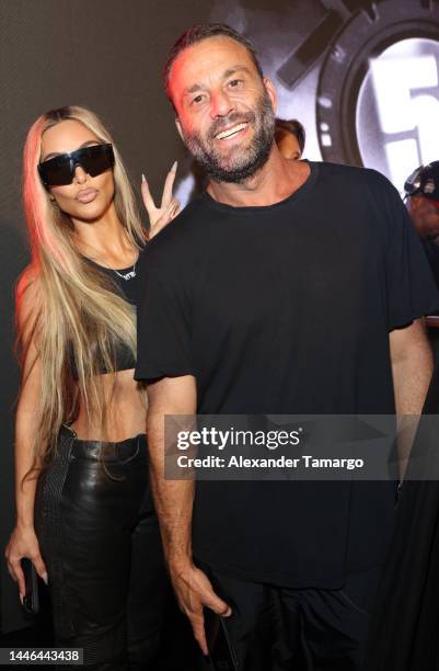 Kim Kardashian and David Grutman attend as Travis Scott and 50 Cent perform at Wayne & Cynthia Boich's Art Basel Party on December 02, 2022 in Miami...