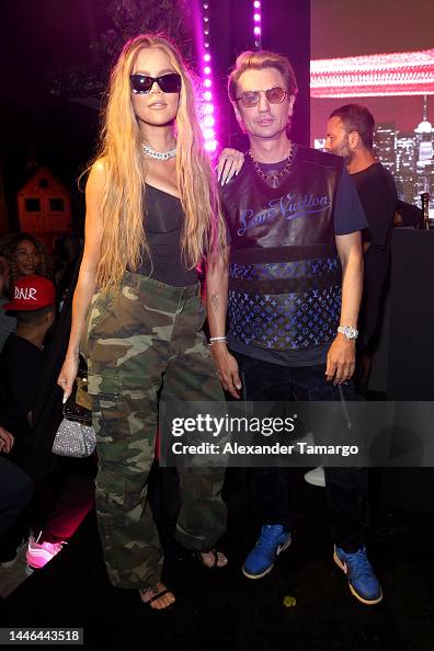 Khloe Kardashian and Jonathan Cheban attend as Travis Scott and 50