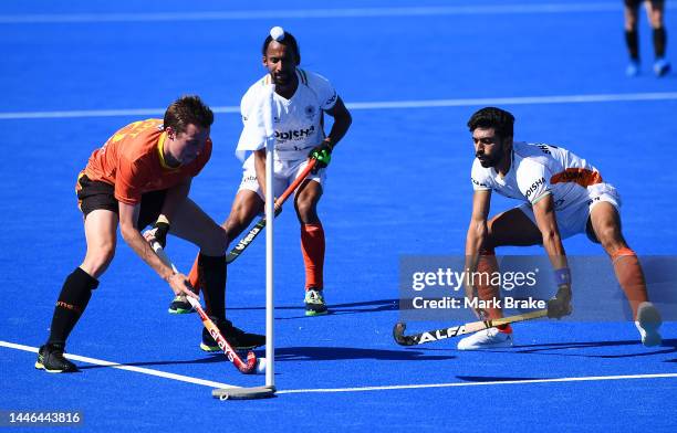 Ky Willott of the Kookaburras looks to pass from the corner defended by Akashdeep Singh of India during game 4 of the International Hockey Test...