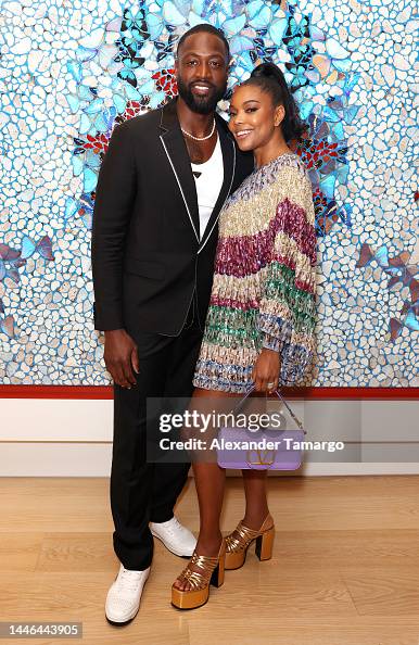 Dwyane Wade and Gabrielle Union attend as Travis Scott and 50 Cent