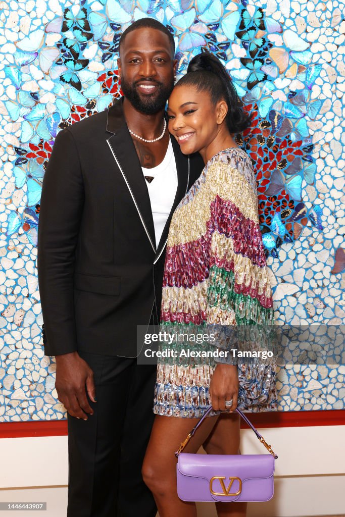 Dwyane Wade and Gabrielle Union attend as Travis Scott and 50 Cent