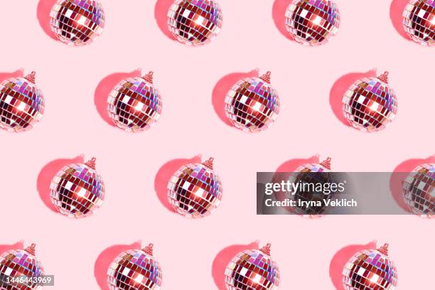 merry christmas and happy new year pattern. silver disco ball on  pastel pink viva magenta color of the year 2023 background. - disco ball bildbanksfoton och bilder