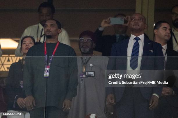 Former football player Samuel Eto'o of Cameroon and President of CAF Patrice Motsepe during the FIFA World Cup Qatar 2022 Group G match between...