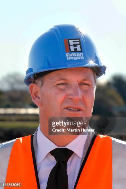 New Zealand Prime Minister John Key looks on during a visit to Longhurst housing sub-division on May 17, 2012 in Christchurch, New Zealand. Prime...