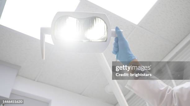 dental lamp - dentist's chair stock pictures, royalty-free photos & images