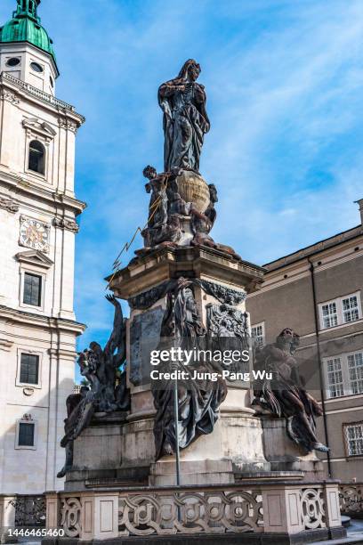 the statue of the virgin mary in domplatz, salzburg, austria - domplatz salzburg stock pictures, royalty-free photos & images