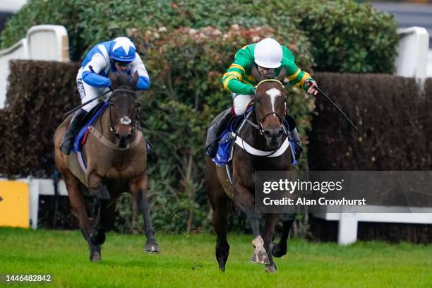 Aidan Coleman riding Jonbon clear the last to win The Close Brothers Henry VIII Novices' Chase at Sandown Park Racecourse on December 03, 2022 in...