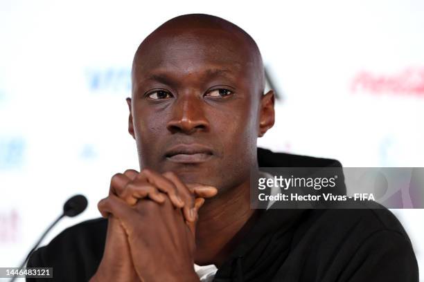 Alfred Gomis of Senegal speaks during Senegal press conference on match day -1 at Main Media Center on December 03, 2022 in Doha, Qatar.