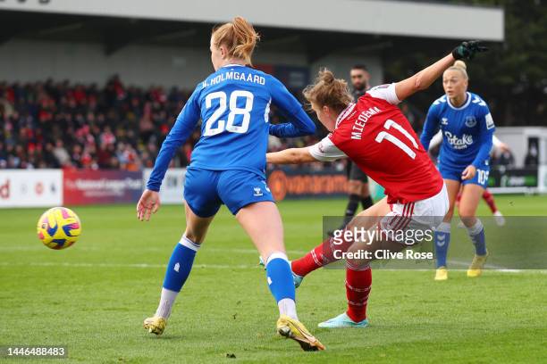 Vivianne Miedema of Arsenal scores their side's first goal during the FA Women's Super League match between Arsenal and Everton FC at Meadow Park on...