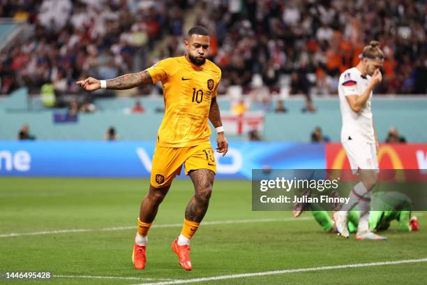 Memphis Depay of Netherlands celebrates after scoring the team's first goal during the FIFA World Cup Qatar 2022 Round of 16 match between...