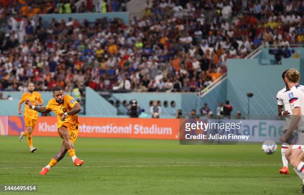 Memphis Depay of Netherlands scores the team's first goal during the FIFA World Cup Qatar 2022 Round of 16 match between Netherlands and USA at...
