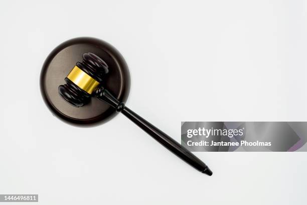 wooden gavel, side on, on white background - 極刑 ストックフォトと画像