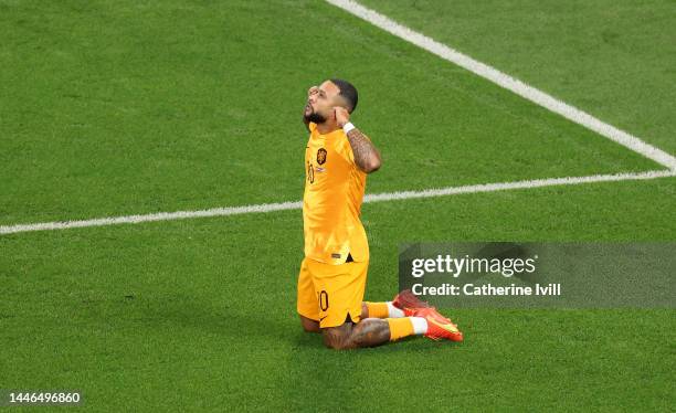 Memphis Depay of Netherlands celebrates after scoring the team's first goal during the FIFA World Cup Qatar 2022 Round of 16 match between...