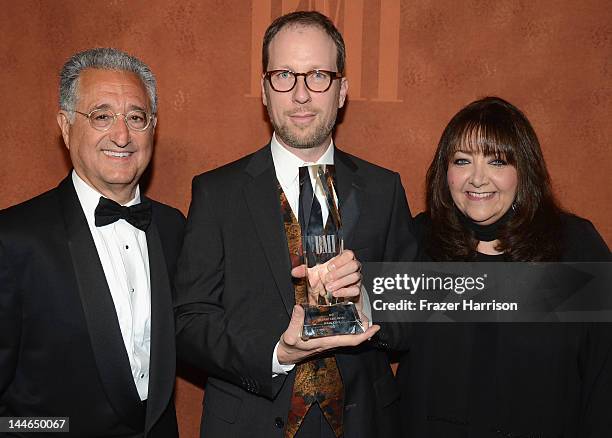 President and CEO Del Bryant Honoree Rolfe Kent and Vice President Film and Television Relations Doreen Ringer Ross arrive at the 60th Annual BMI...