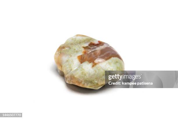 agate rocks on white background - marble rock stock pictures, royalty-free photos & images