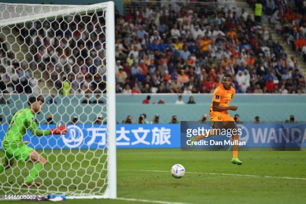 Denzel Dumfries of Netherlands scores the team's third goal during the FIFA World Cup Qatar 2022 Round of 16 match between Netherlands and USA at...