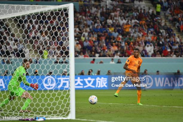 Denzel Dumfries of Netherlands scores the team's third goal during the FIFA World Cup Qatar 2022 Round of 16 match between Netherlands and USA at...