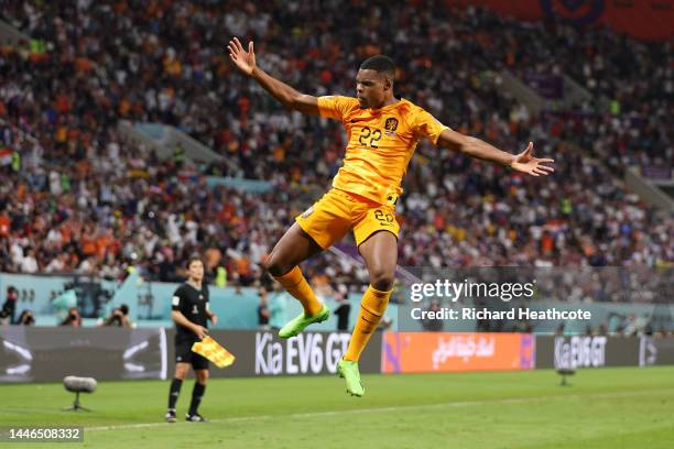 Denzel Dumfries of Netherlands celebrates after scoring the team's third goal during the FIFA World Cup Qatar 2022 Round of 16 match between...