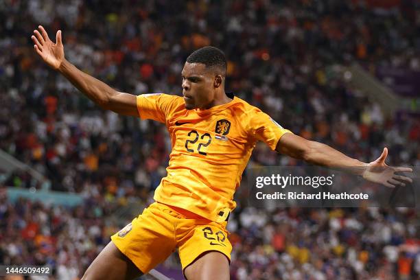 Denzel Dumfries of Netherlands celebrates after scoring the team's third goal during the FIFA World Cup Qatar 2022 Round of 16 match between...