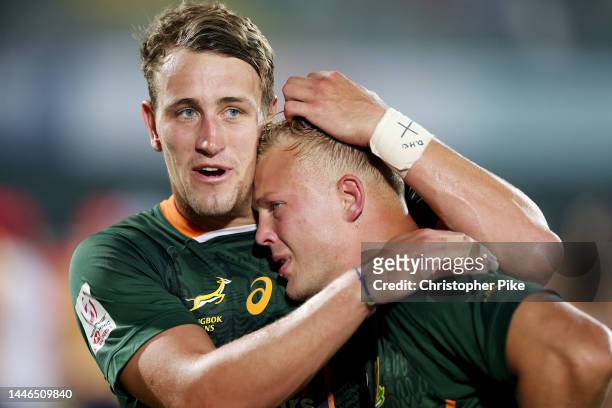 James Murphy and JC Pretorius of South Africa react after winning the Men's Cup Final match between South Africa and Ireland on Day Two of the HSBC...