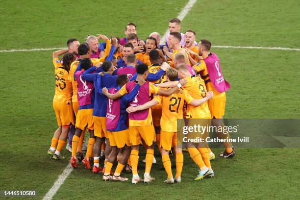 Netherlands players huddle after the 3-1 win during the FIFA World Cup Qatar 2022 Round of 16 match between Netherlands and USA at Khalifa...