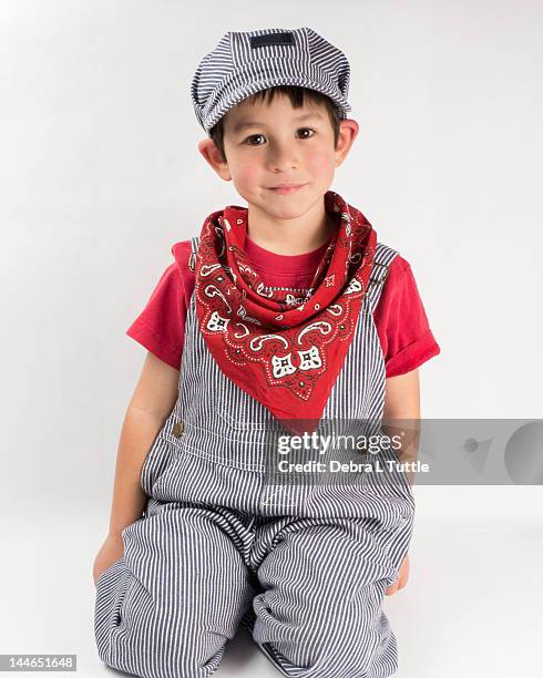 young boy wearing train engineer costume - kids costume engineer stock-fotos und bilder